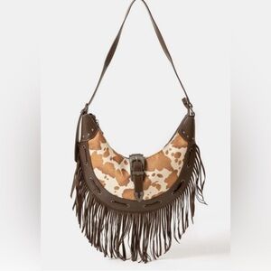 Cow print faux leather fringe hobo bag